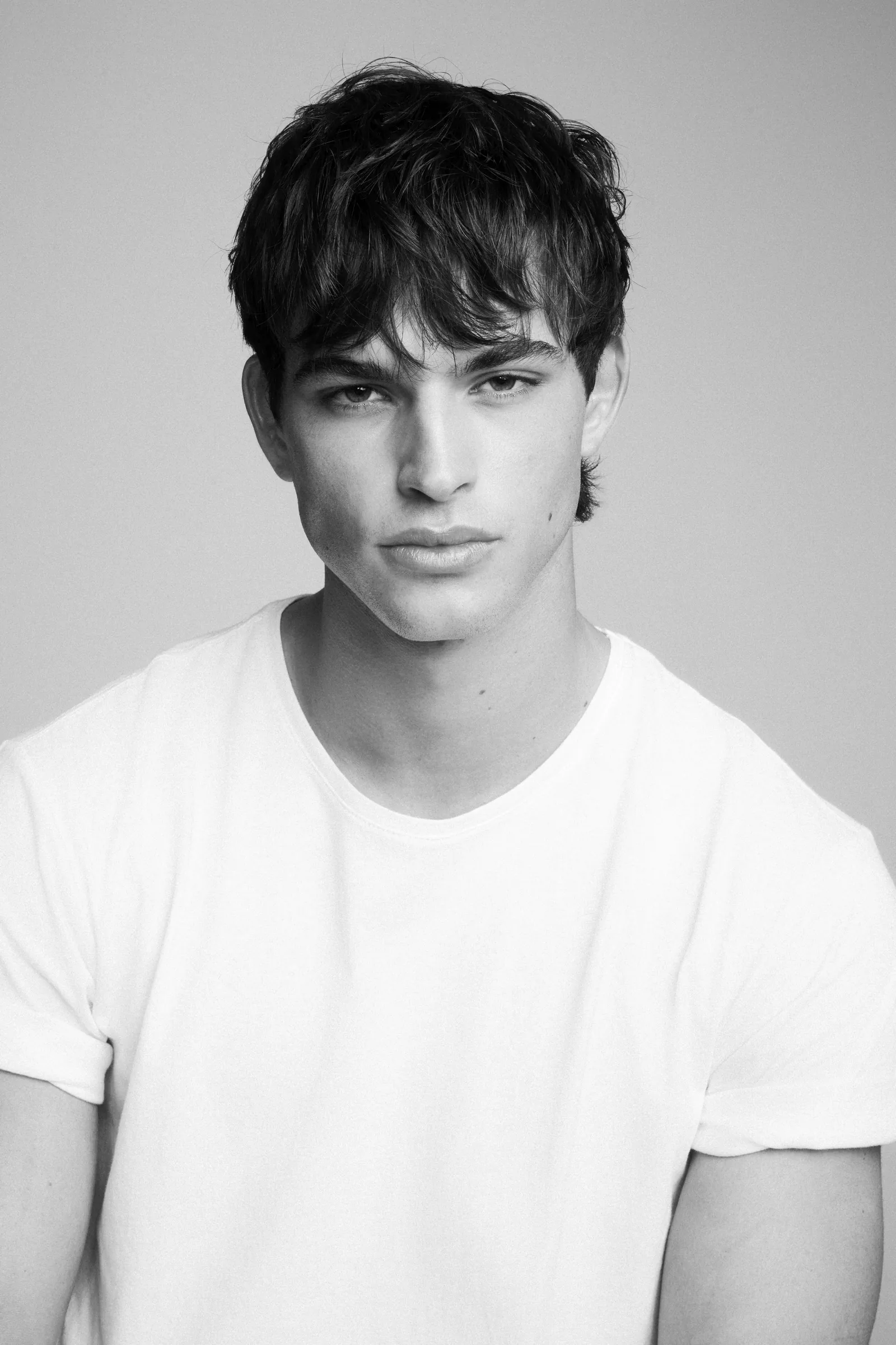 Young stylist portrait in a white tee