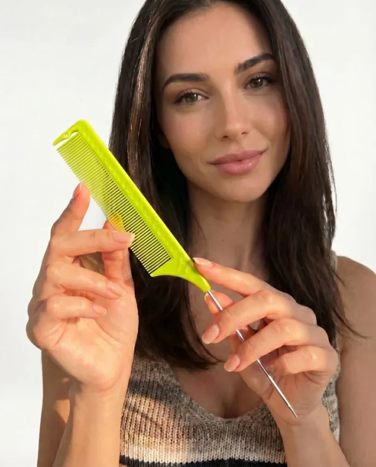 Model with a Hanzo hair cutting comb